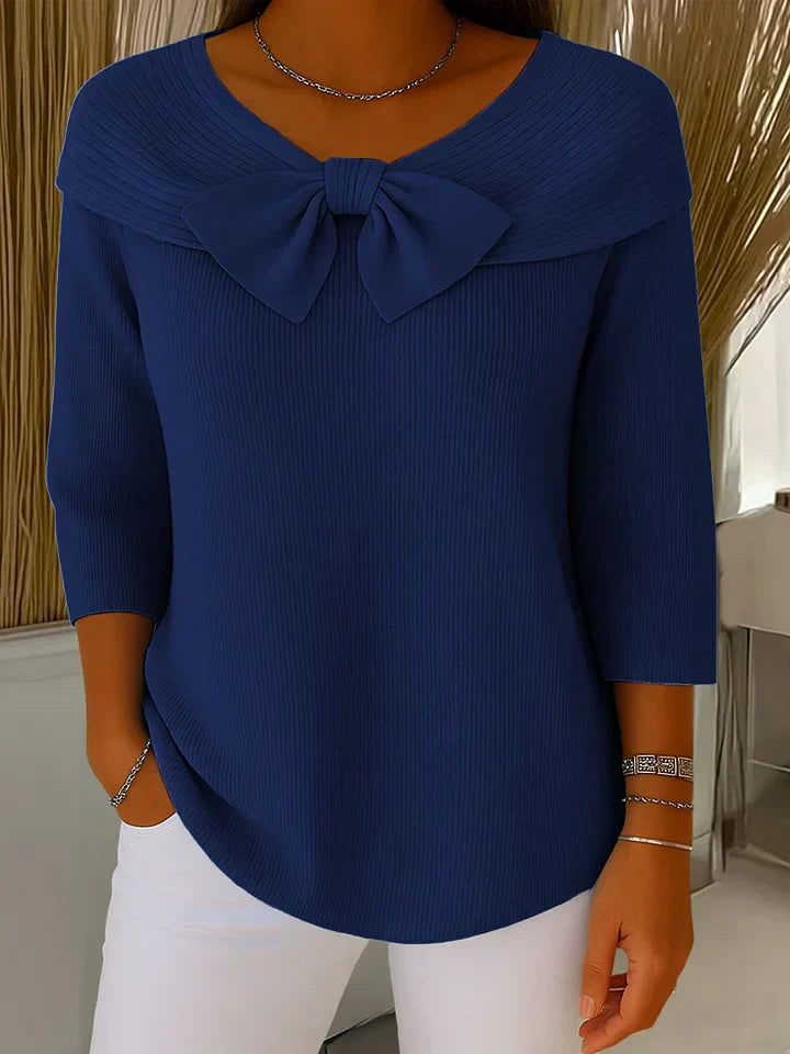 Flattering women's long sleeve sweater with an elegant bow detail, a must-have for fall & winter fashion.