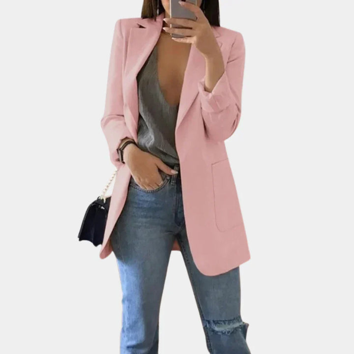 Front view of a sleek women's long blazer, offering a modern slim fit. Ideal professional formal jacket for work.