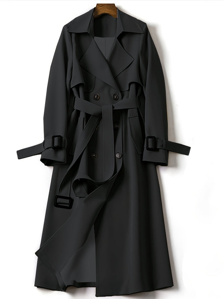 Stylish women's longline trench coat with double-breasted detailing, perfect for a chic look.