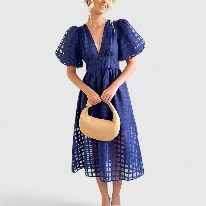 Effortless women's elegant midi dress. Comfortable yet chic, perfect for spring/summer versatile casual or formal styling.