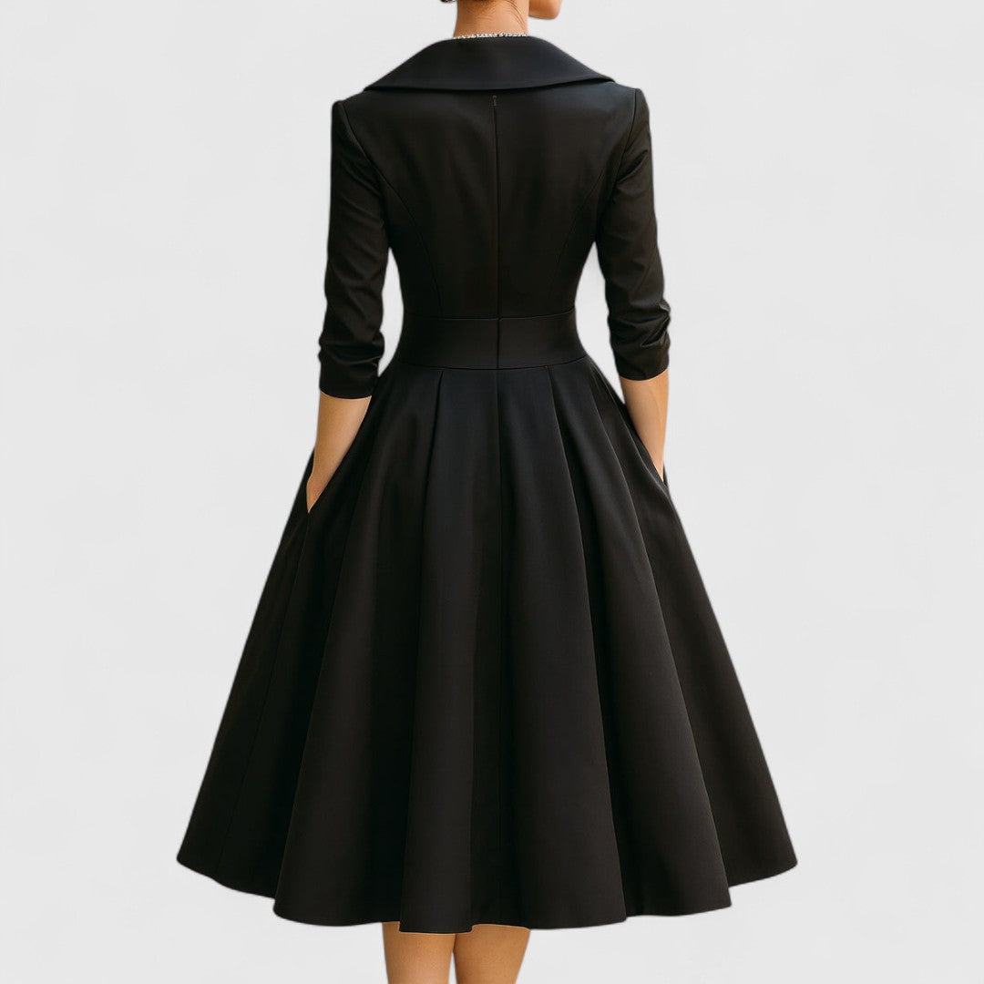 Sophisticated women's midi dress. Flattering fit, V-neck, 3/4 sleeves, ideal for evening or office wear.