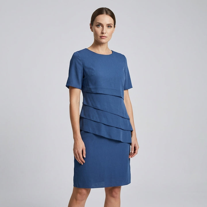 Comfortable women's elegant midi dress featuring a round neck & short sleeves. Easy care chic style.