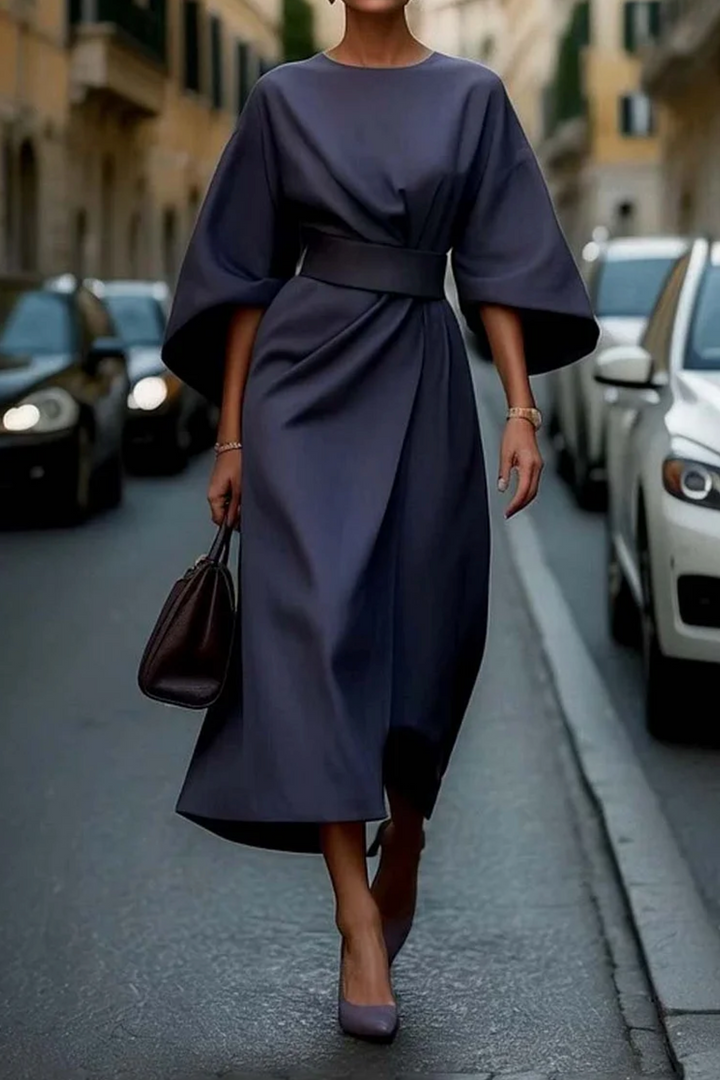 Versatile belted midi dress for women, featuring wide sleeves & round neck, ideal for spring & summer style.