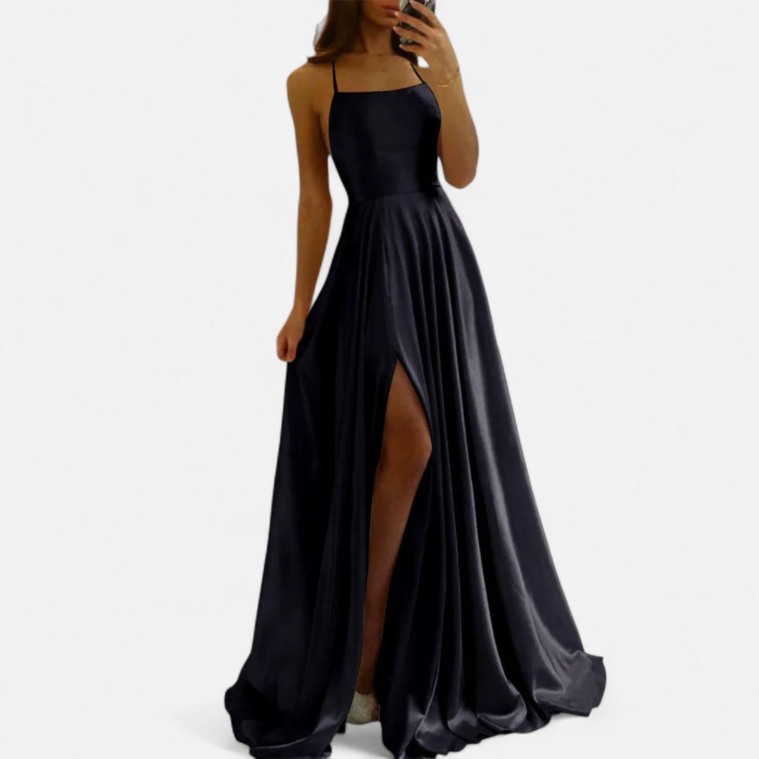 Gorgeous women's satin maxi dress with an alluring slit, suitable for elegant events and formal occasions