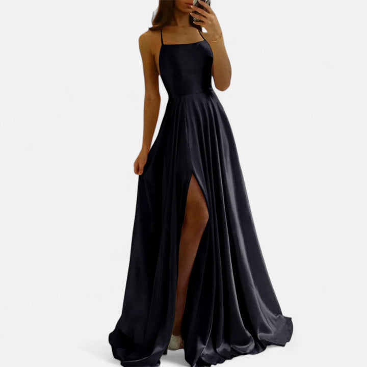 Gorgeous women's satin maxi dress with an alluring slit, suitable for elegant events and formal occasions