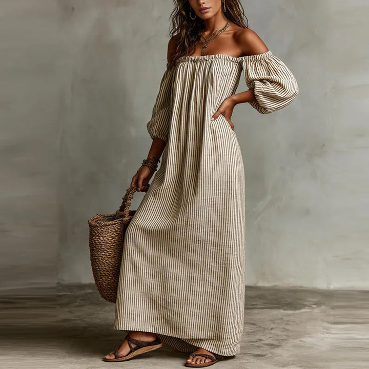 Women's off-shoulder puff sleeve maxi dress, an elegant and comfortable summer vacation outfit.