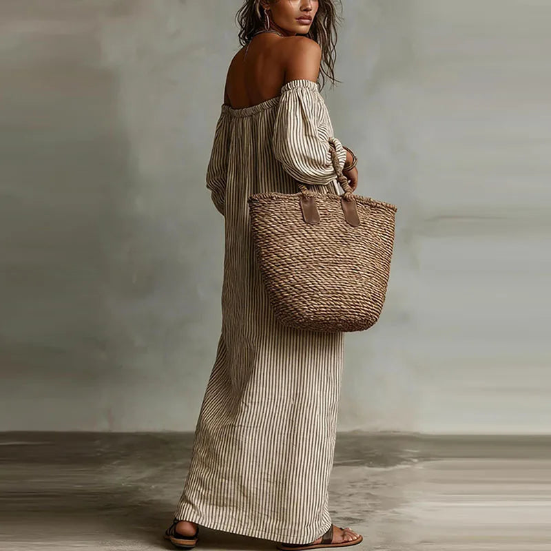 Stylish women's off-shoulder maxi dress, perfect for a summer party or elegant casual look.