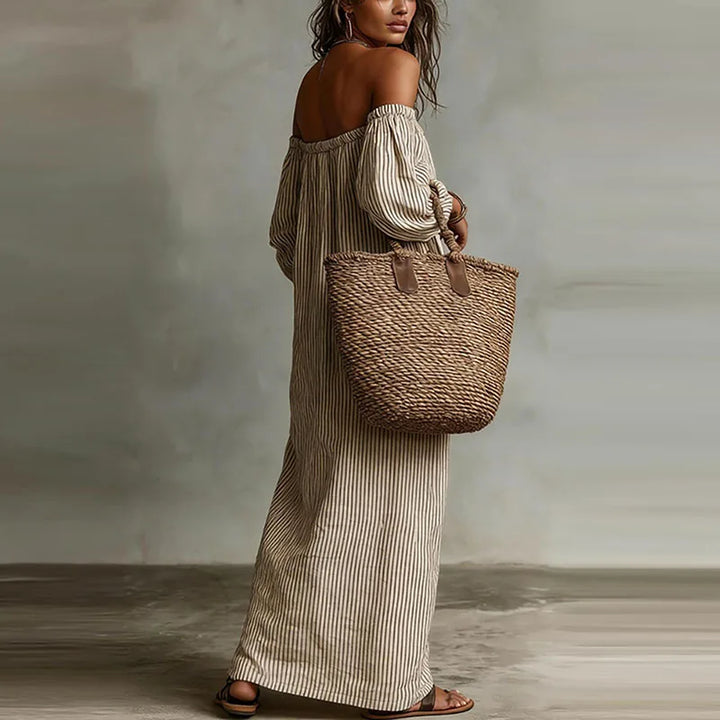 Stylish women's off-shoulder maxi dress, perfect for a summer party or elegant casual look.