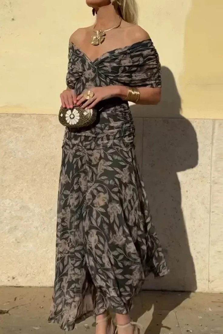 Sophisticated women's off-shoulder midi dress with a flattering ruched silhouette and modern twist front.