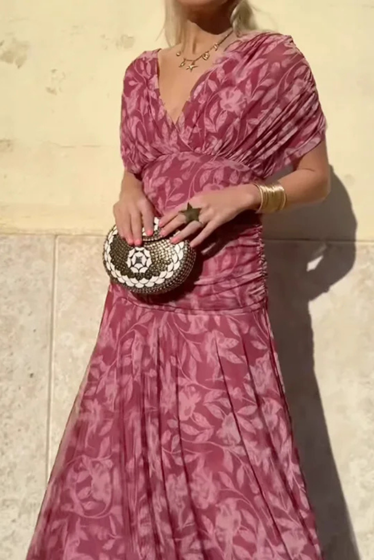 Full length shot of the women's off-shoulder ruched twist midi dress, perfect for special occasions.