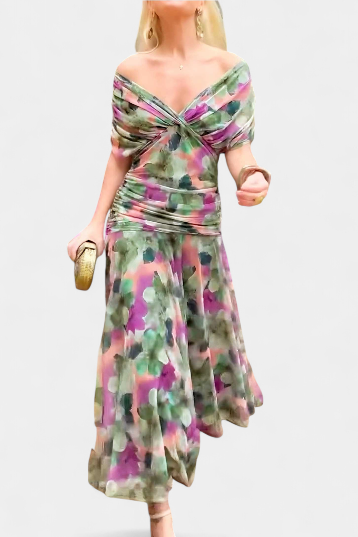 Detailed view of the fabric and ruched texture on the women's off-shoulder twist front midi dress.