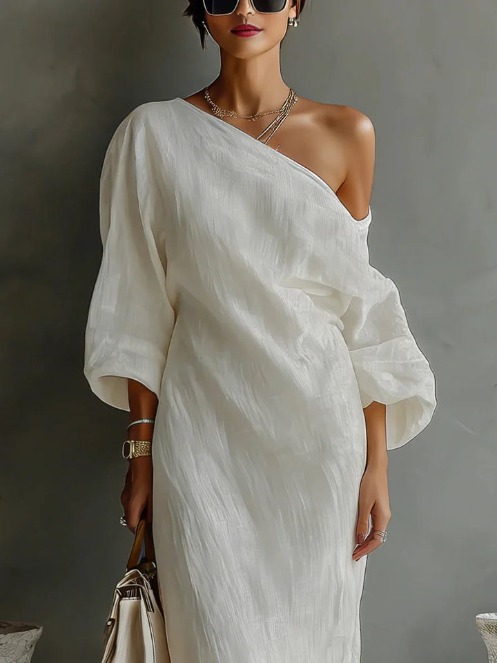 Chic asymmetrical flowy dress for women, featuring a stylish one-shoulder design and relaxed fit.