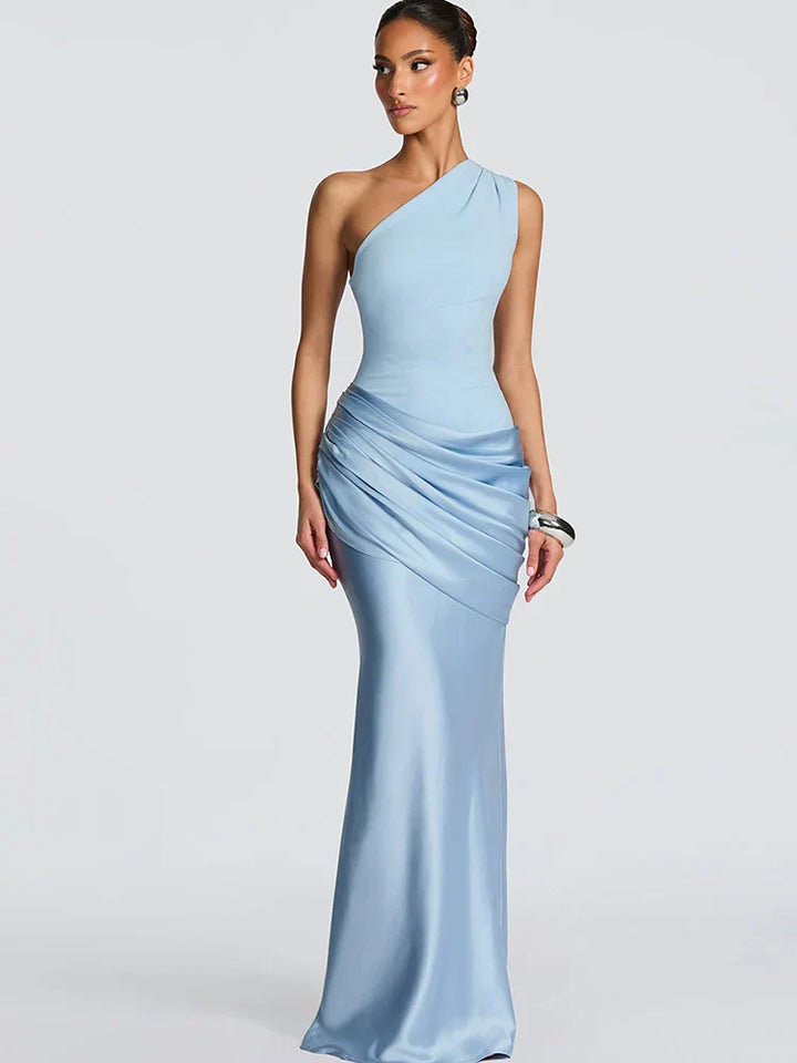 Stylish women's one-shoulder maxi dress. Ideal for wedding guests, formal parties & evening events. Features an asymmetrical neckline.