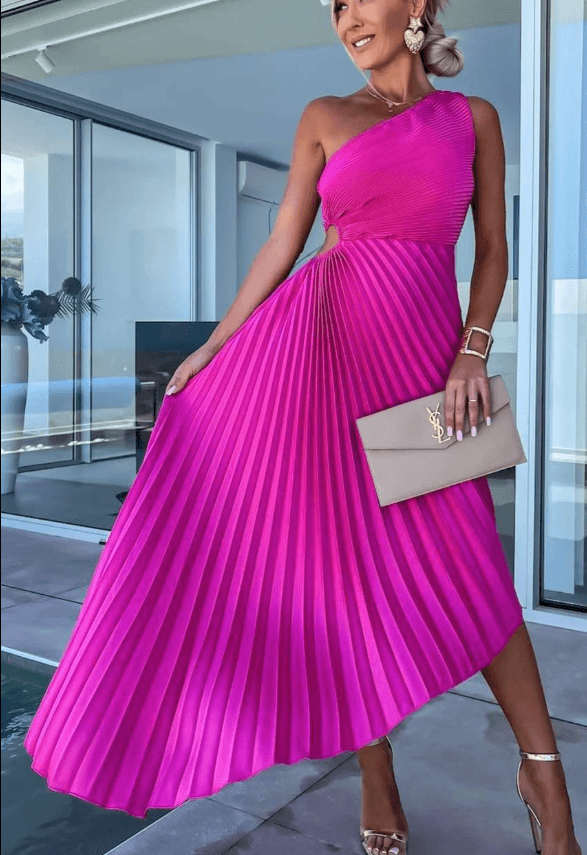 Stylish pleated maxi dress with a unique one-shoulder design, showcasing elegant women's fashion