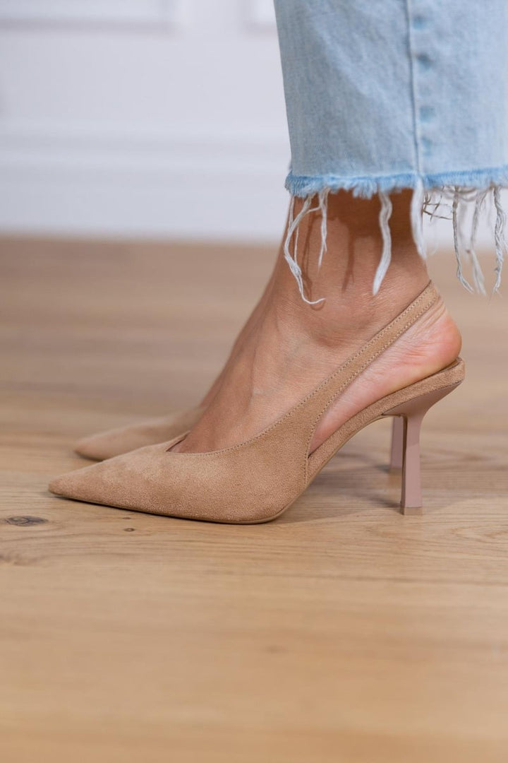 Comfortable orthopedic slingback heels for women. Stylish beige pointed toe design, perfect for dress & work.