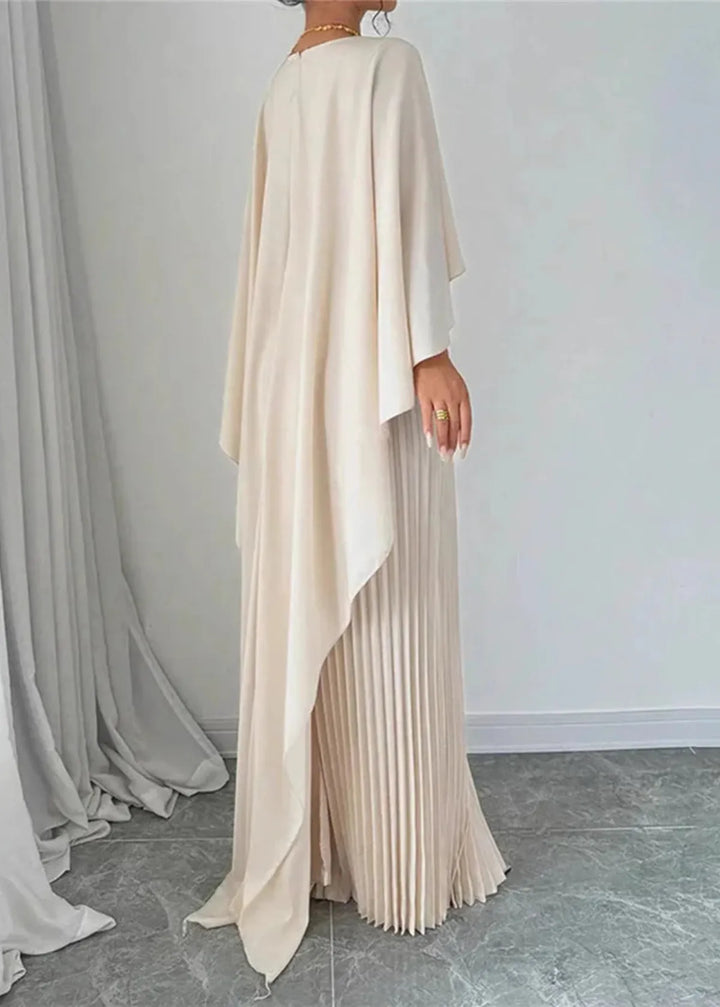 Sophisticated sleeveless maxi dress with a flowing pleated cape, ideal for wedding guests