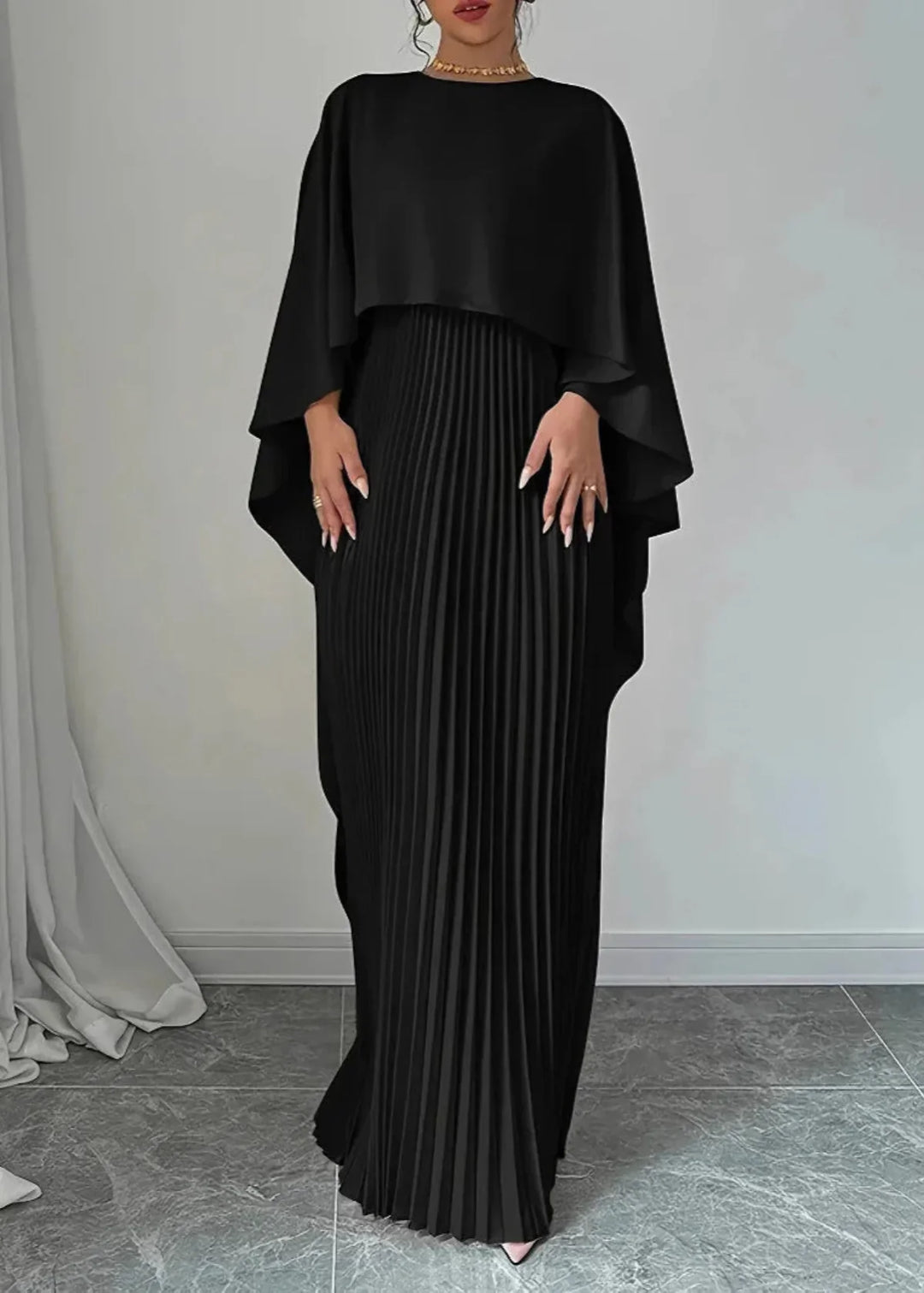 Stylish women's pleated cape overlay maxi dress, a sophisticated choice for evening wear