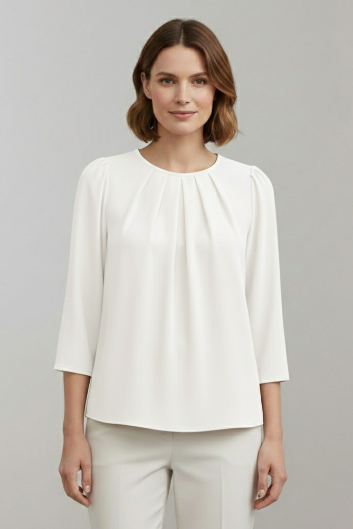 Women's elegant long sleeve pleated top, ideal for office wear and smart casual outfits.