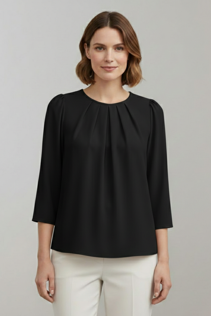 Elegant pleated long sleeve blouse for women, a sophisticated top for professional and casual.