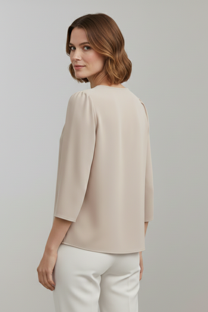 Women's sophisticated pleated long sleeve pullover blouse, offering versatile office chic style.
