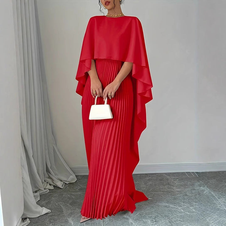 Flowy women's pleated maxi dress with cape overlay, ideal for summer style & casual chic elegance.