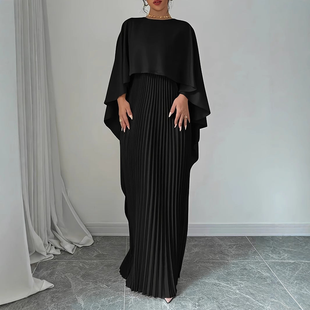 Stylish women's pleated maxi dress with elegant cape overlay. Versatile for evening wear or special events.