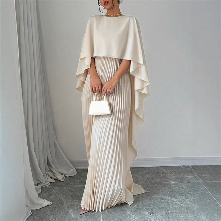 Formal women's elegant pleated maxi dress with a sophisticated cape overlay for evening events.