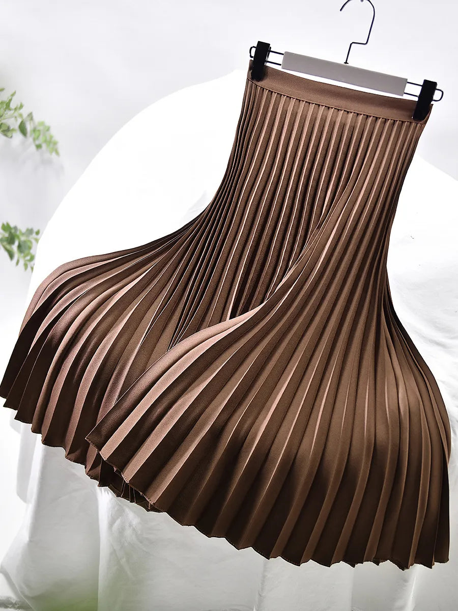 Close-up of the delicate pleats on a women's maxi skirt, showcasing elegant flow and spring style