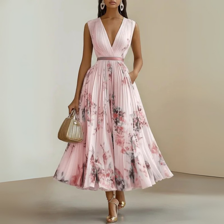 Long pleated V-neck dress for women, featuring a flattering cinched waist & practical pockets.