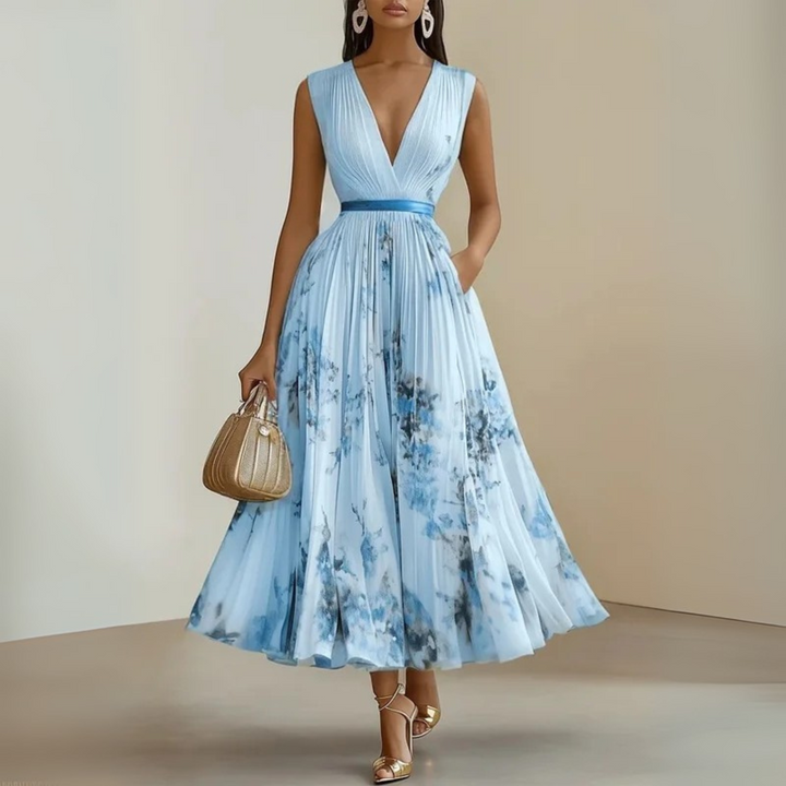 Pleated V-neck long dress for women, designed with a cinched waist for an elegant, flowy silhouette.