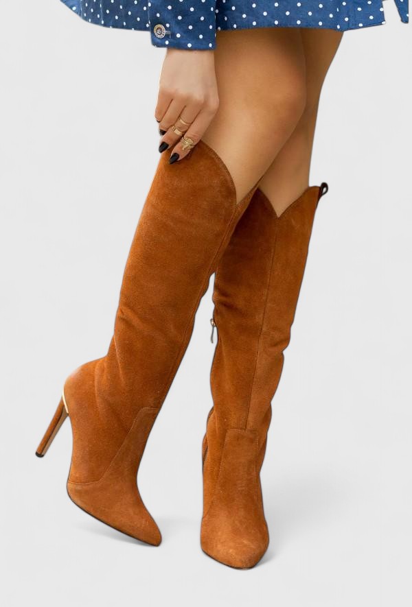 Fashionable women's beige suede pointed toe knee boots, offering sophisticated summer style