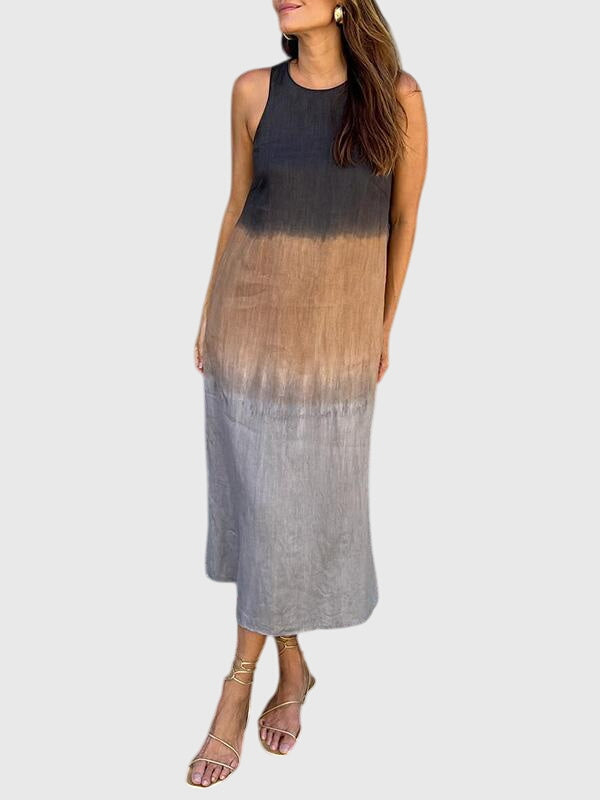 Chic women's flowing dress with vibrant print, perfect for summer or casual wear.