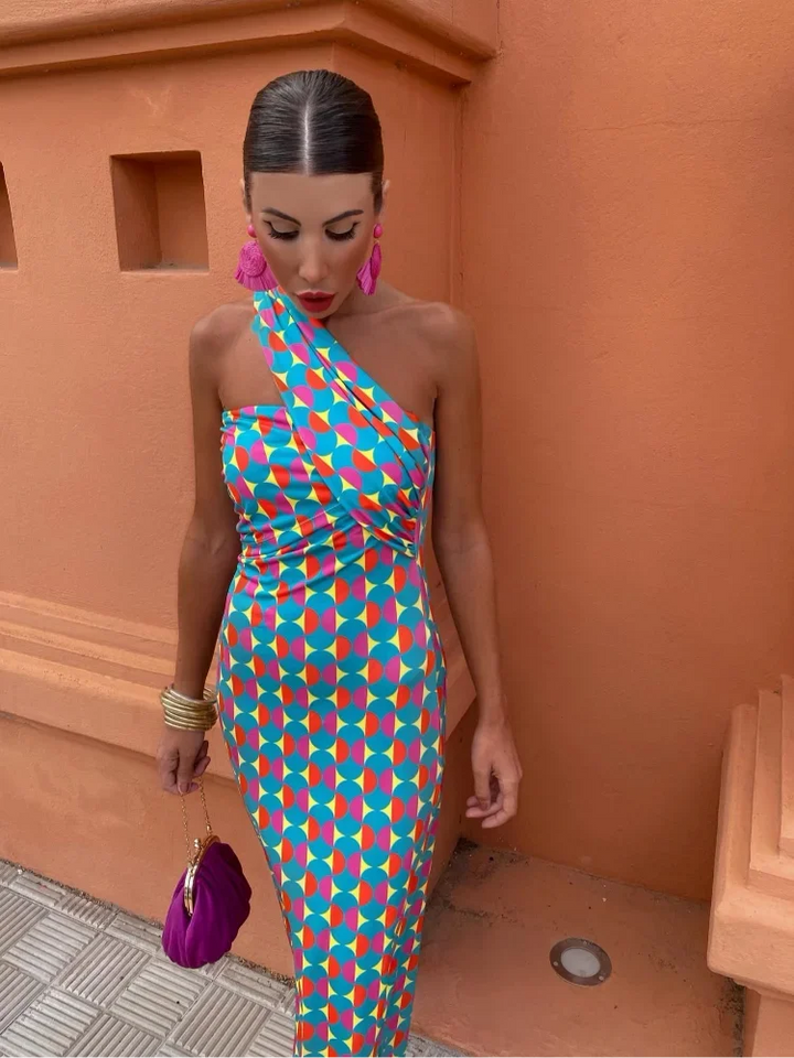 Women's elegant floral printed maxi dress with a unique one-shoulder neckline for occasion wear.