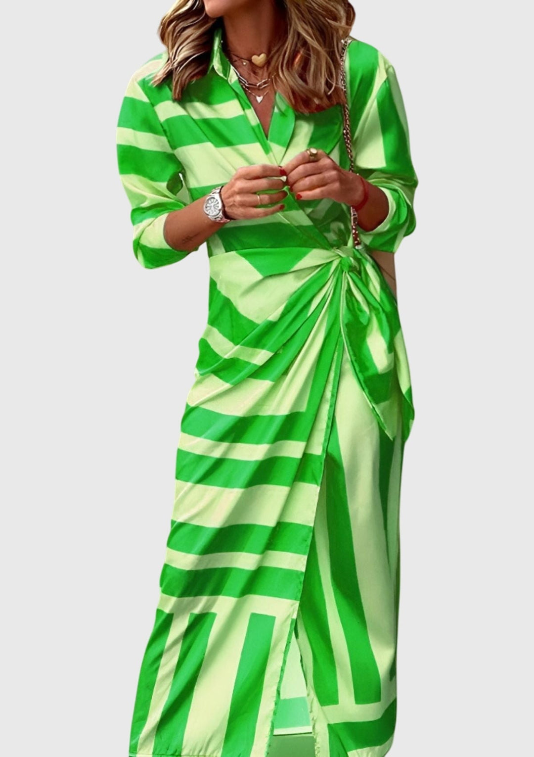 Flowy elegant women's printed wrap dress, flattering silhouette for spring & summer fashion.
