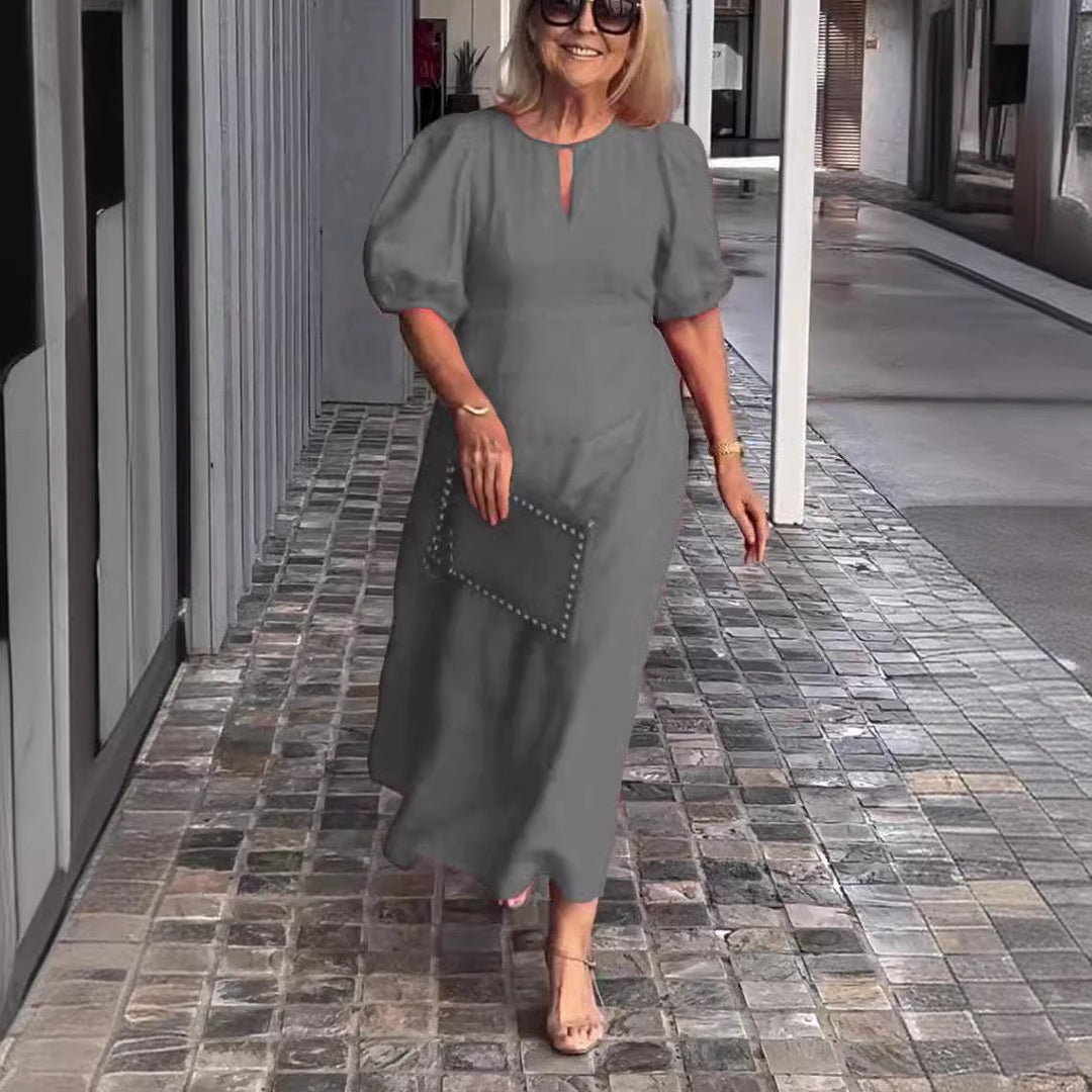 Casual chic women's midi dress with elegant puff sleeves. Ideal for summer style & versatile fashion.