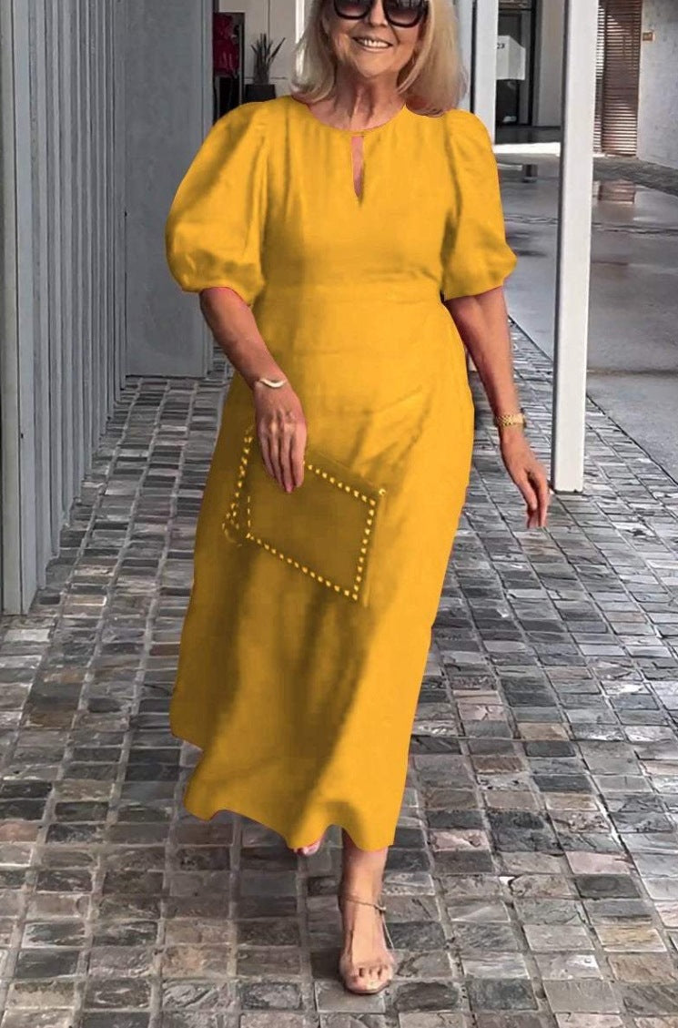 Chic women's cocktail dress: puff-sleeve midi style. Elegant choice for special occasions & formal wear.