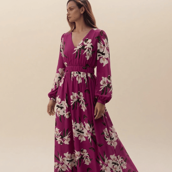Elegant women's purple floral maxi dress with long sleeves and v-neck, perfect for versatile casual and dressy occasions.