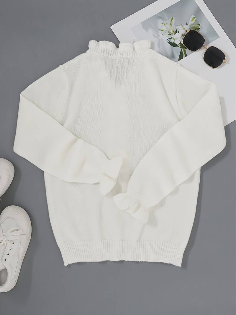 Long sleeve women's ruffle blouse featuring stylish decorative buttons on the front.