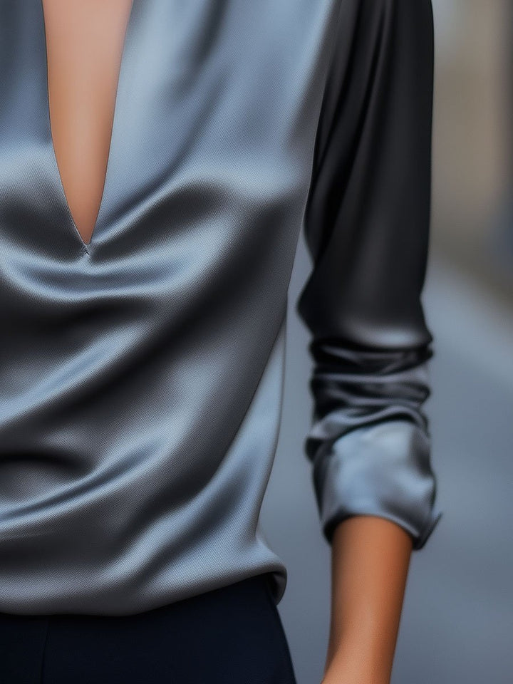 Fashionable women's V-neck satin blouse, long sleeve design, suitable for elegant office wear.
