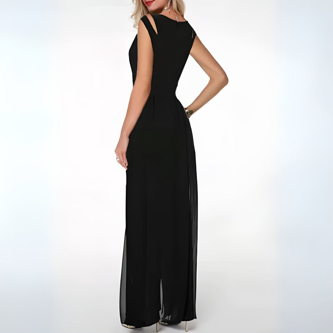 Sleeveless wide-leg women's jumpsuit with sheer overlay, a stylish evening gown alternative for cocktail parties.