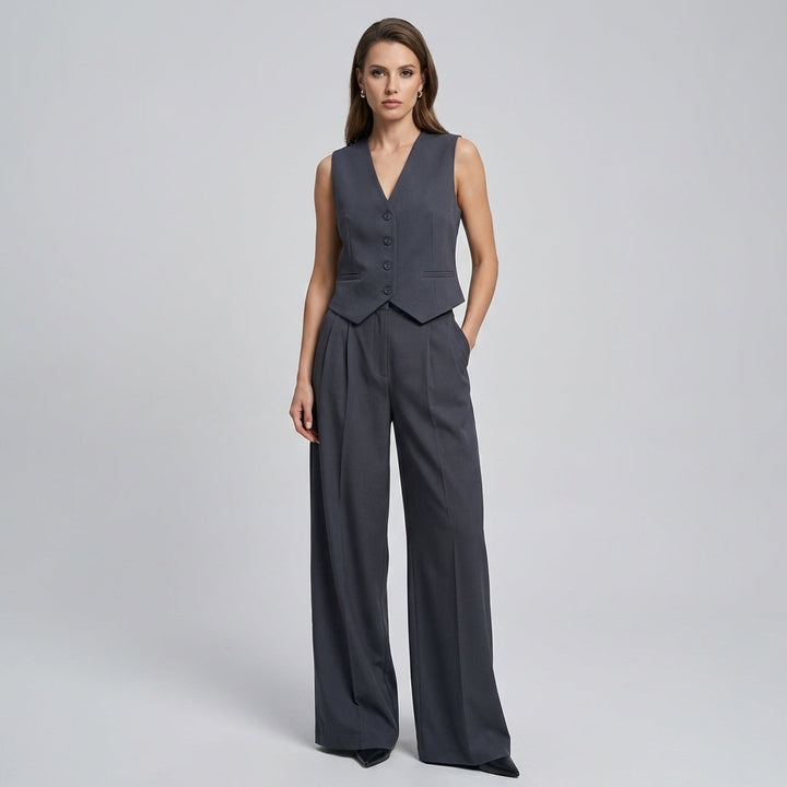 Elegant women's sleeveless blazer & slim trousers set, perfect for business or chic casual wear.