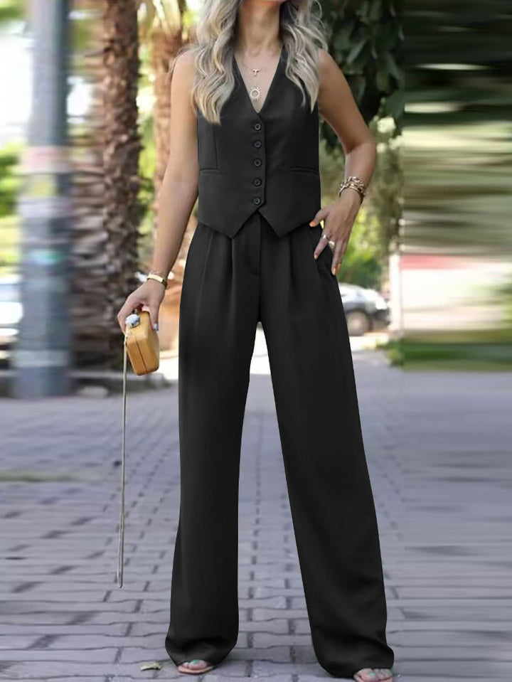 New elegant women's sleeveless blazer and slim trousers set, a modern two-piece outfit for spring fashion.