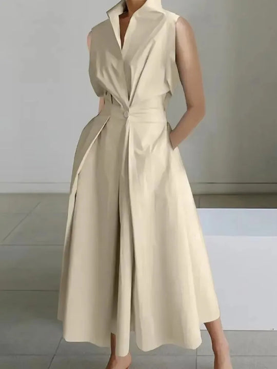 Elegant women's sleeveless lapel midi dress with pockets. Perfect A-line summer office wear.