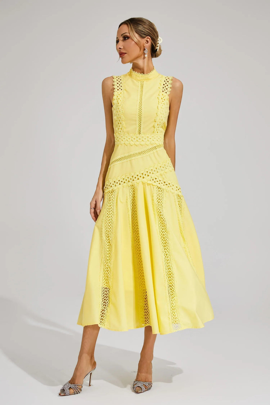 Chic women's sleeveless lace midi dress, offering an elegant and feminine style for various special occasions.