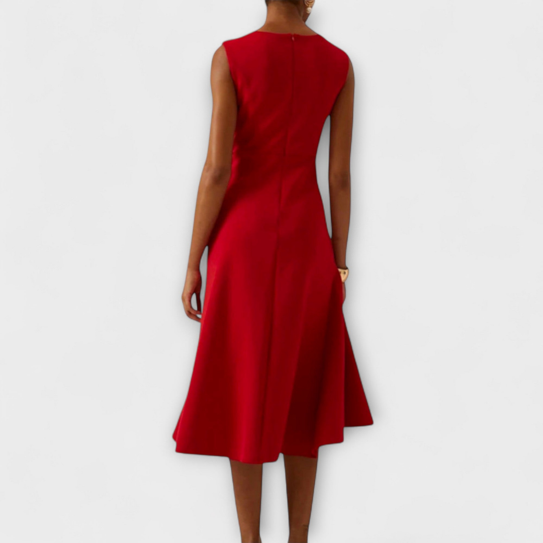 Women's midi dress featuring a stylish draped knot and ruffle hem, sleeveless & elegant for special occasions.