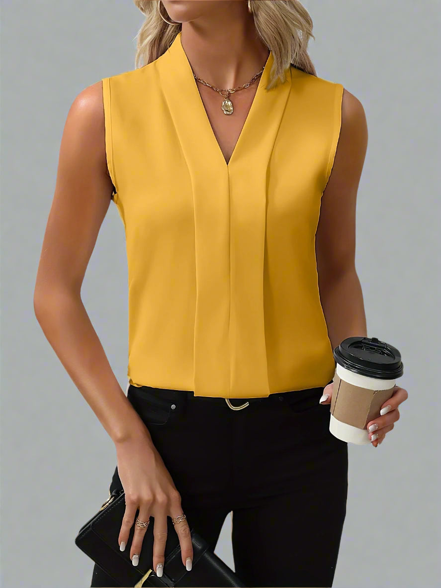 Stylish ladies' sleeveless V-neck blouse, an elegant top for professional settings & year-round fashion.