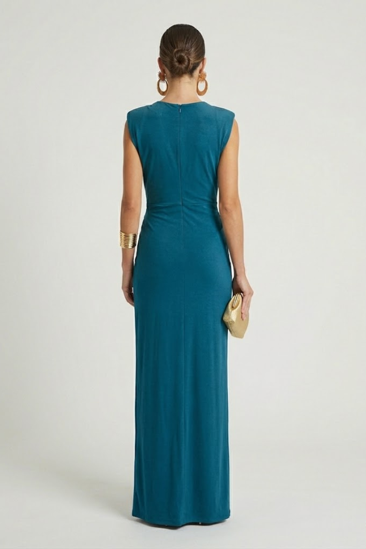 Stylish long women's pleated maxi dress with a flattering V-neck, suitable for all seasons.