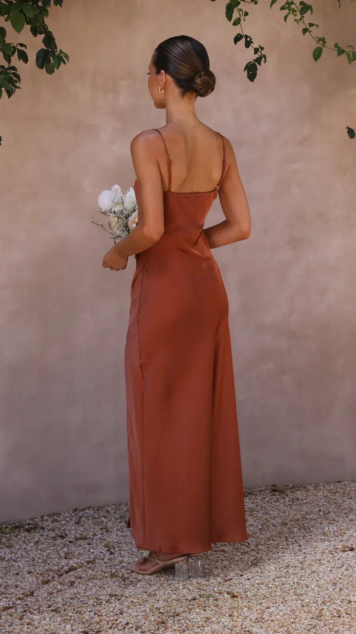 Flowing satin maxi dress for women, ideal for spring fashion and sophisticated evening events.