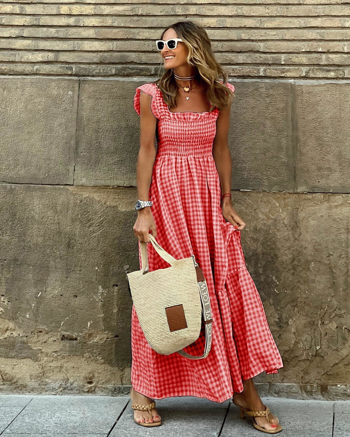 Chic women's party maxi dress featuring a flattering square neck, ruffle sleeves, and elegant tiered skirt.