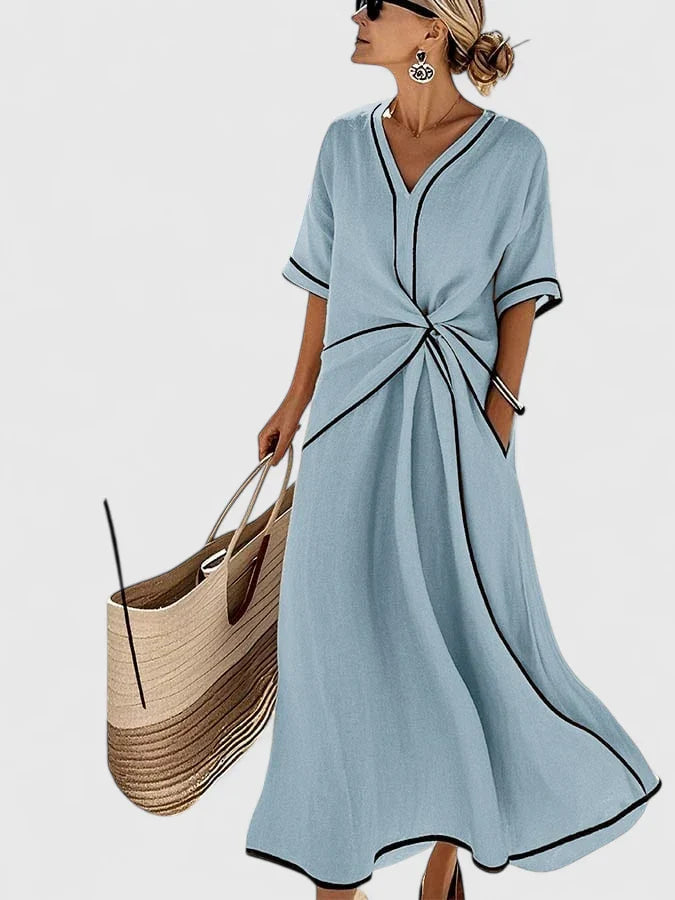 Chic women's striped midi dress with short sleeves, ideal for effortless summer style, everyday wear, or beach vacations.